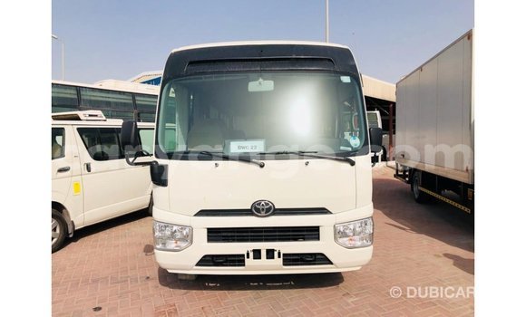 Acheter Import Voiture Toyota Coaster Blanc à Import - Dubai, Namibie Acheter Import Voiture Toyota Coaster Blanc à Import - Dubai, Namibie