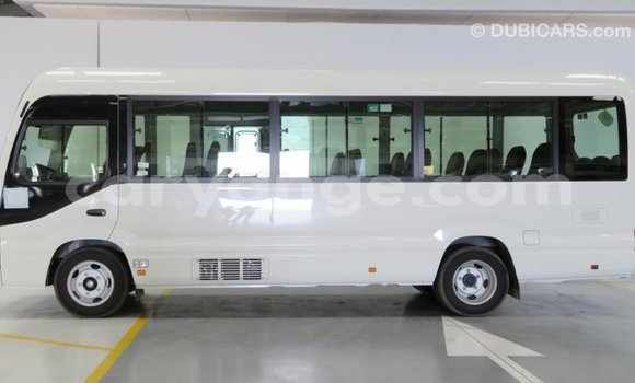 Acheter Import Voiture Toyota Coaster Blanc à Import - Dubai, Namibie Acheter Import Voiture Toyota Coaster Blanc à Import - Dubai, Namibie