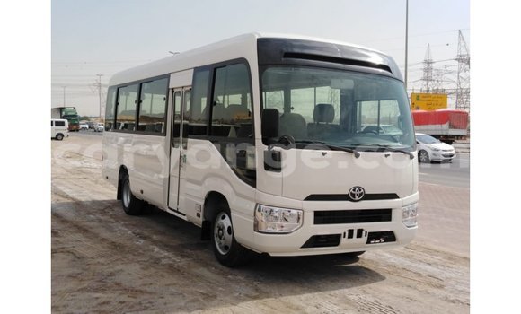 Acheter Import Voiture Toyota Coaster Blanc à Import - Dubai, Namibie Acheter Import Voiture Toyota Coaster Blanc à Import - Dubai, Namibie