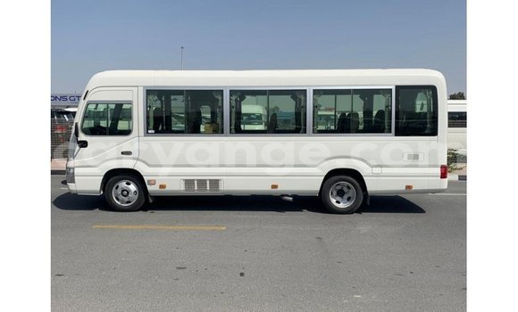 Acheter Import Voiture Toyota Coaster Blanc à Import - Dubai, Namibie Acheter Import Voiture Toyota Coaster Blanc à Import - Dubai, Namibie